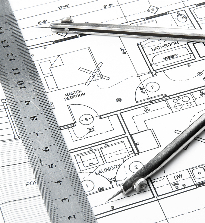 Bauplan mit einem Zirckel und Lineal